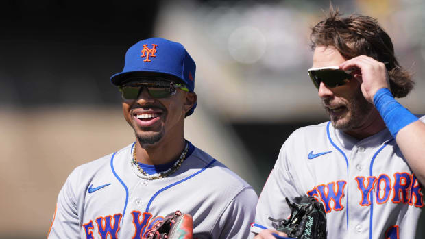 New York Mets shortstop Francisco Lindor still owes Jeff McNeil a new car.
